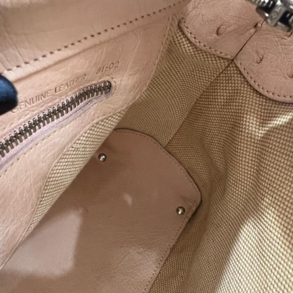 TOD'S 膚色液下包 
