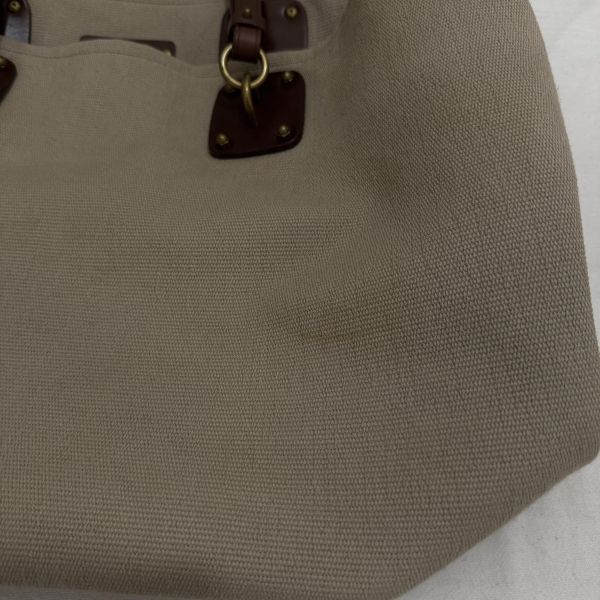 BOTTEGA VENETA 帆布金釦手腕袋卡其 