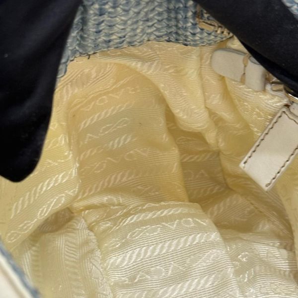 Prada 蛇皮拼接腋下包 