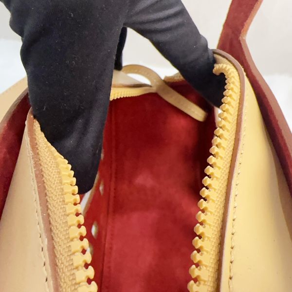 Bally 復古鏤空皮革肩背包 