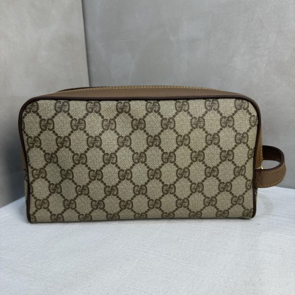 Gucci 復古 GG 圖騰手拿包 