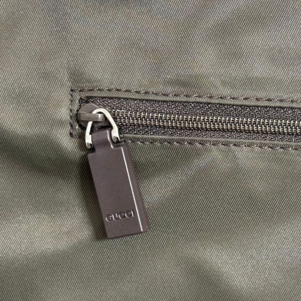 Gucci 滿版老花西裝手提包 