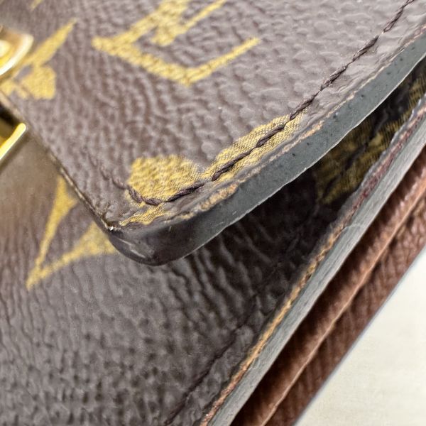 Louis Vuitton 曼哈頓金釦短夾 
