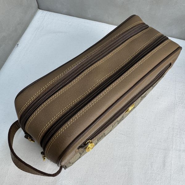 Gucci 復古 GG 圖騰手拿包 