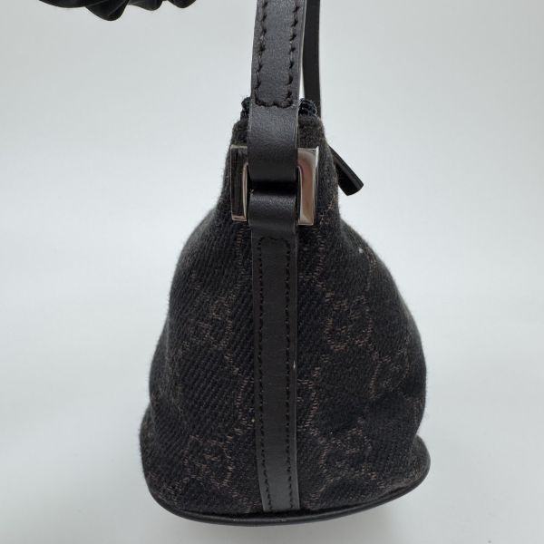 Gucci 黑色老花腋下包 