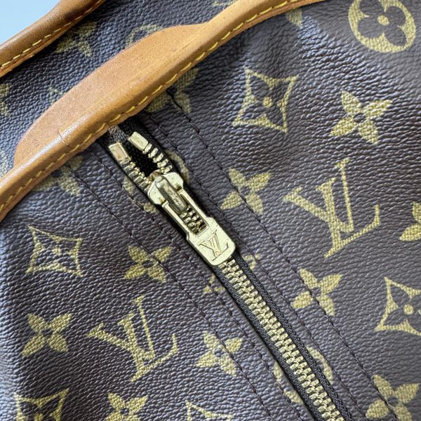 Louis Vuitton  Monogram 帆布西裝套 