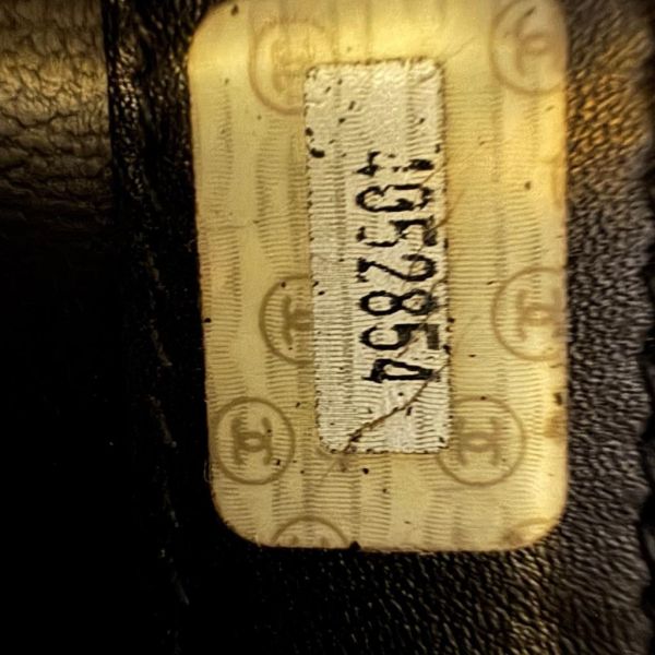 Chanel 菱格紋黑金旅行袋 