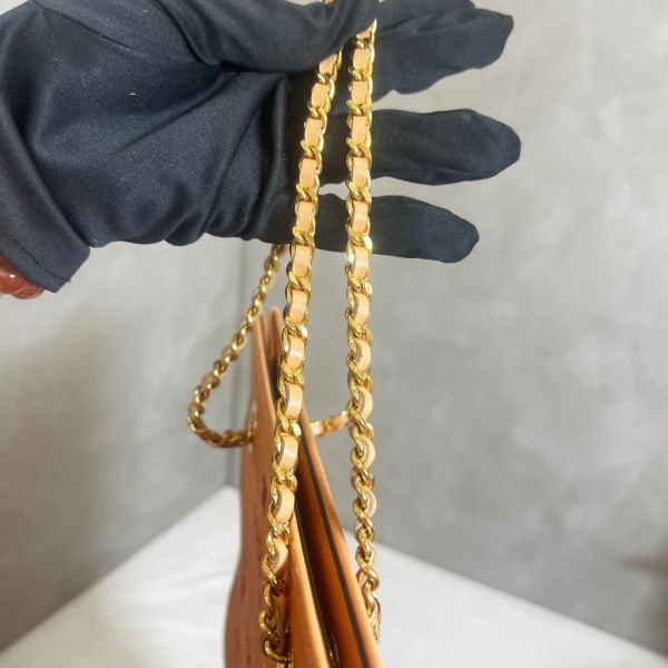 CHANEL 粉紅色帆布COCO印花包 