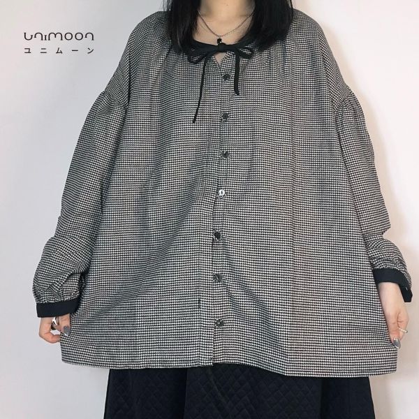 𝟮𝟲𝟭𝟭𝟵 千鳥格磨毛綁帶排扣落肩上衣 